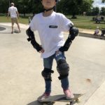 Harrison with his school of skate t-shirt