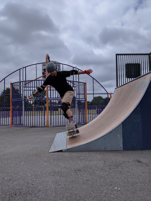 Adult beginner lesson kickturn on skateboard